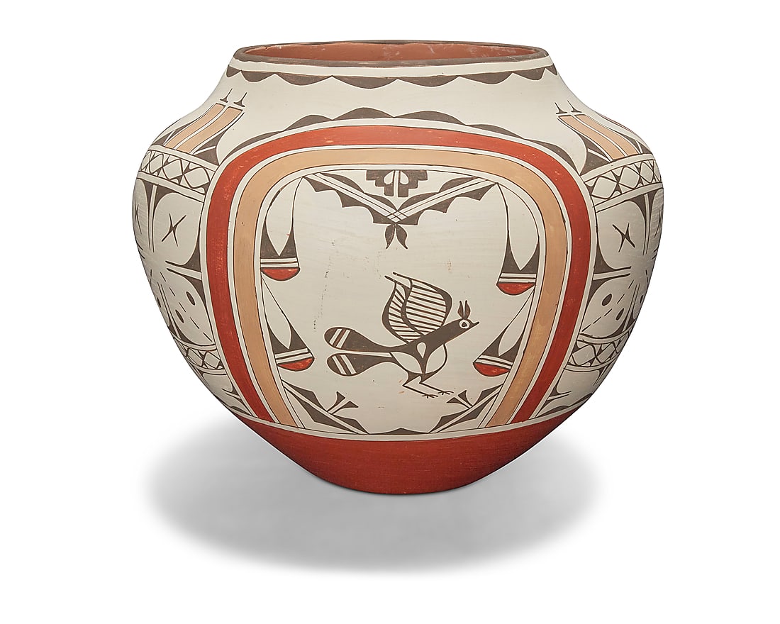 Ruby Panana (b. 1954, Zia Pueblo), A large polychrome pottery olla: Ruby Panana (b. 1954, Zia Pueblo) A large polychrome pottery olla Signed to underside: Ruby Panana / Zia The four-color jar with orange, taupe, and black bird and kiva decorations on white slip