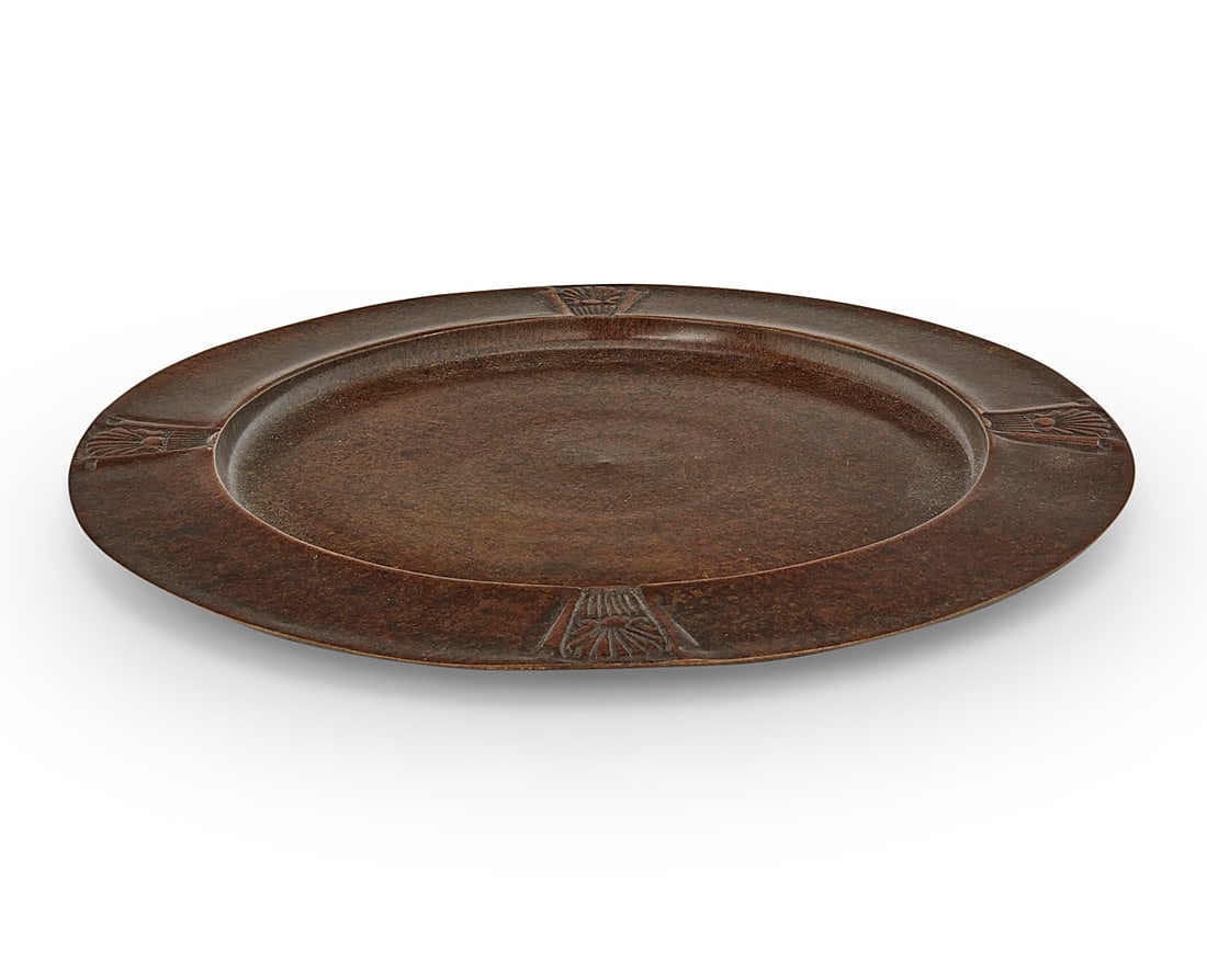 A Tiffany & Co. patinated metal tray: A Tiffany & Co. patinated metal tray Early 20th century Impressed to underside: Tiffany & Co. / 4155 Height 5/8 in., diameter 12 in.
