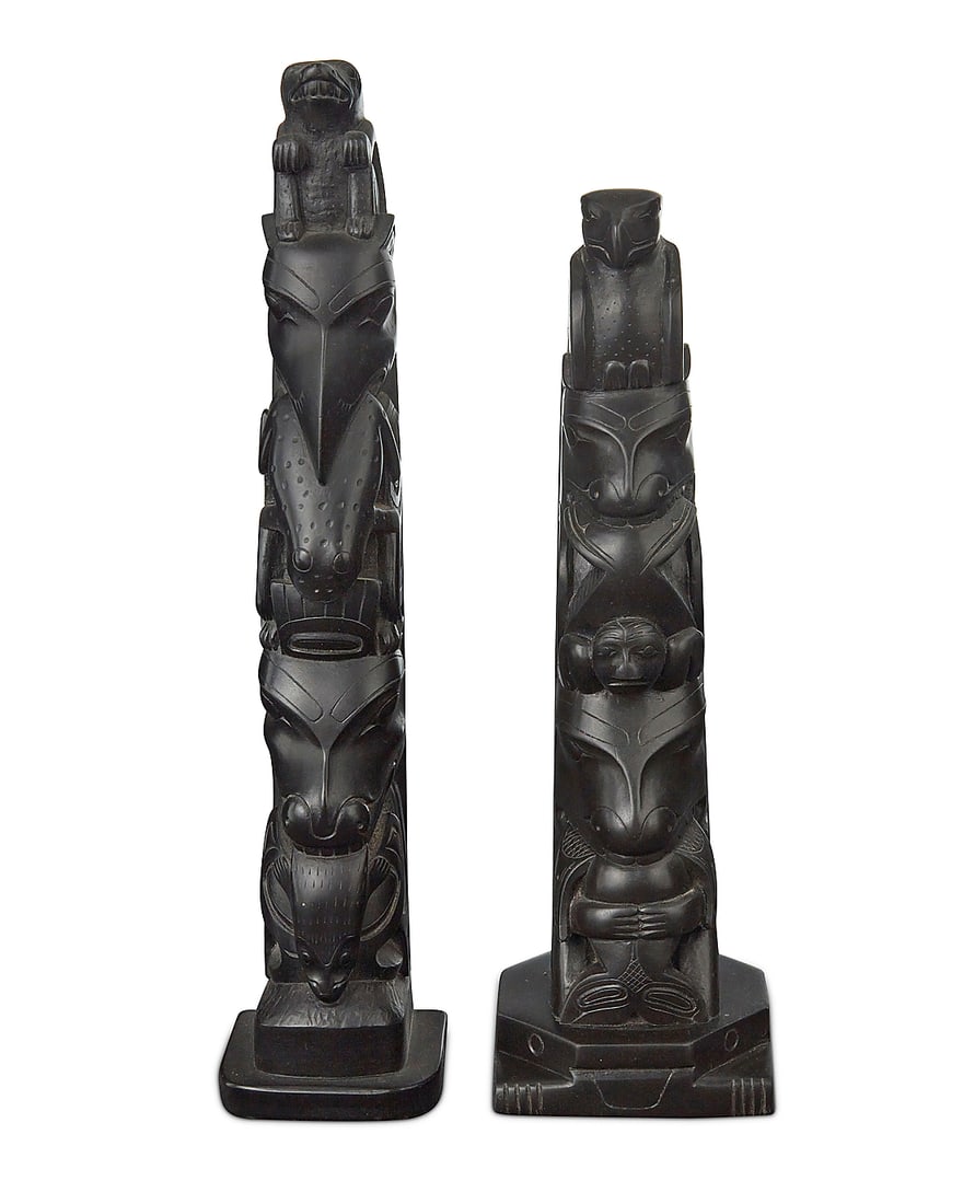 Two carved model totem poles - 2