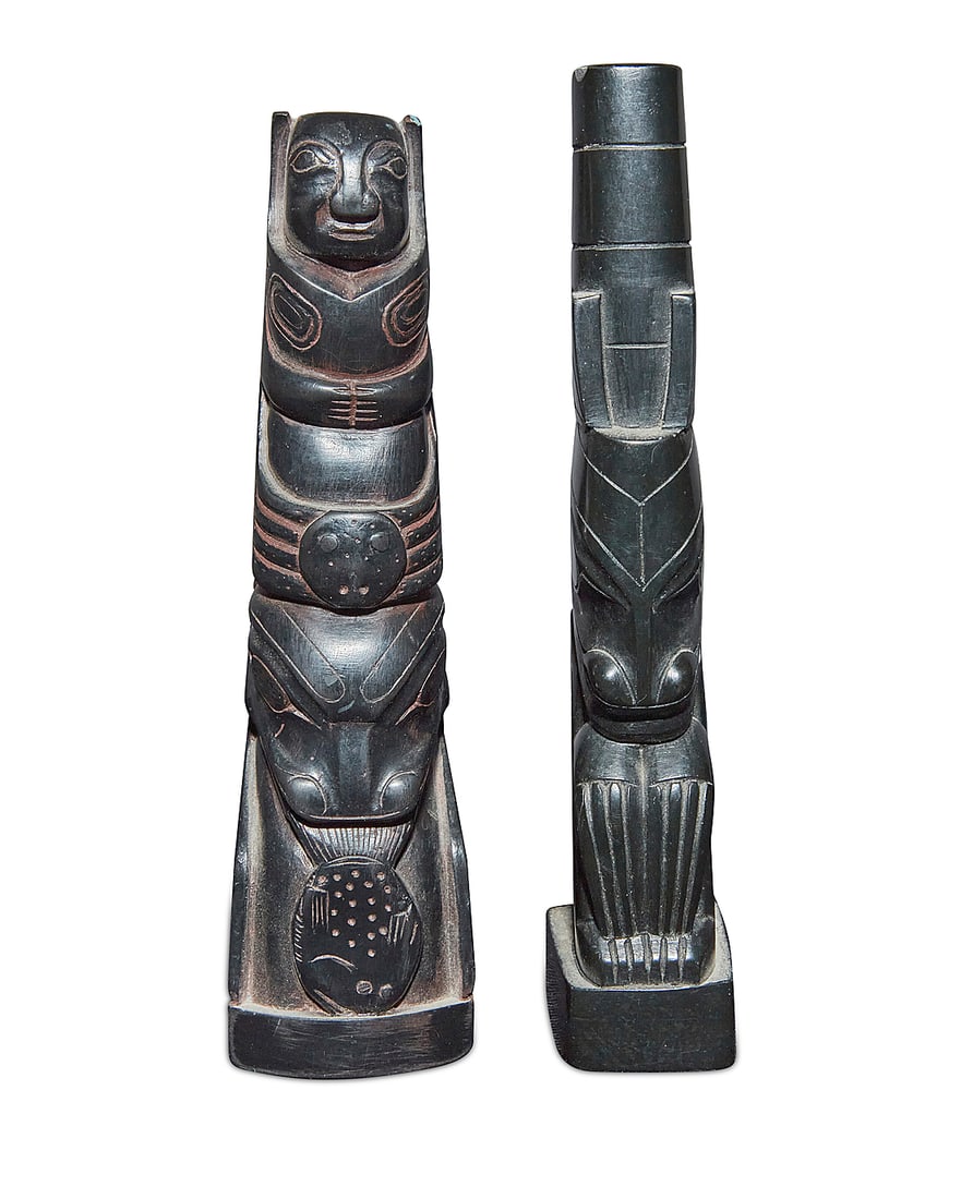 Two carved model totem poles - 2