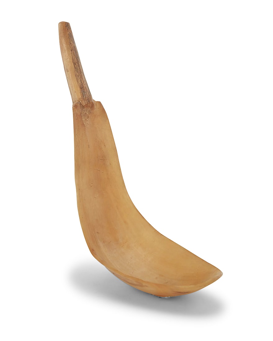 A Northwest Coast mountain sheep horn spoon: A Northwest Coast mountain sheep horn spoon 20th century The large carved horn spoon with a tapered handle Height 11 1/2 in., width 3 3/4 in., depth 5 1/2 in. approximately