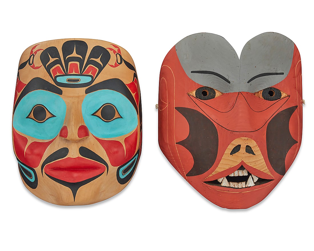 Two Northwest Coast polychrome carved wood masks: Two Northwest Coast polychrome carved wood masks Two works: Ray Holt (20th century, Tsimshian; Metlakatla, AK) An 'Eagle Spirit" mask with blue, red, and black painted stylized features, circa 1986 Si