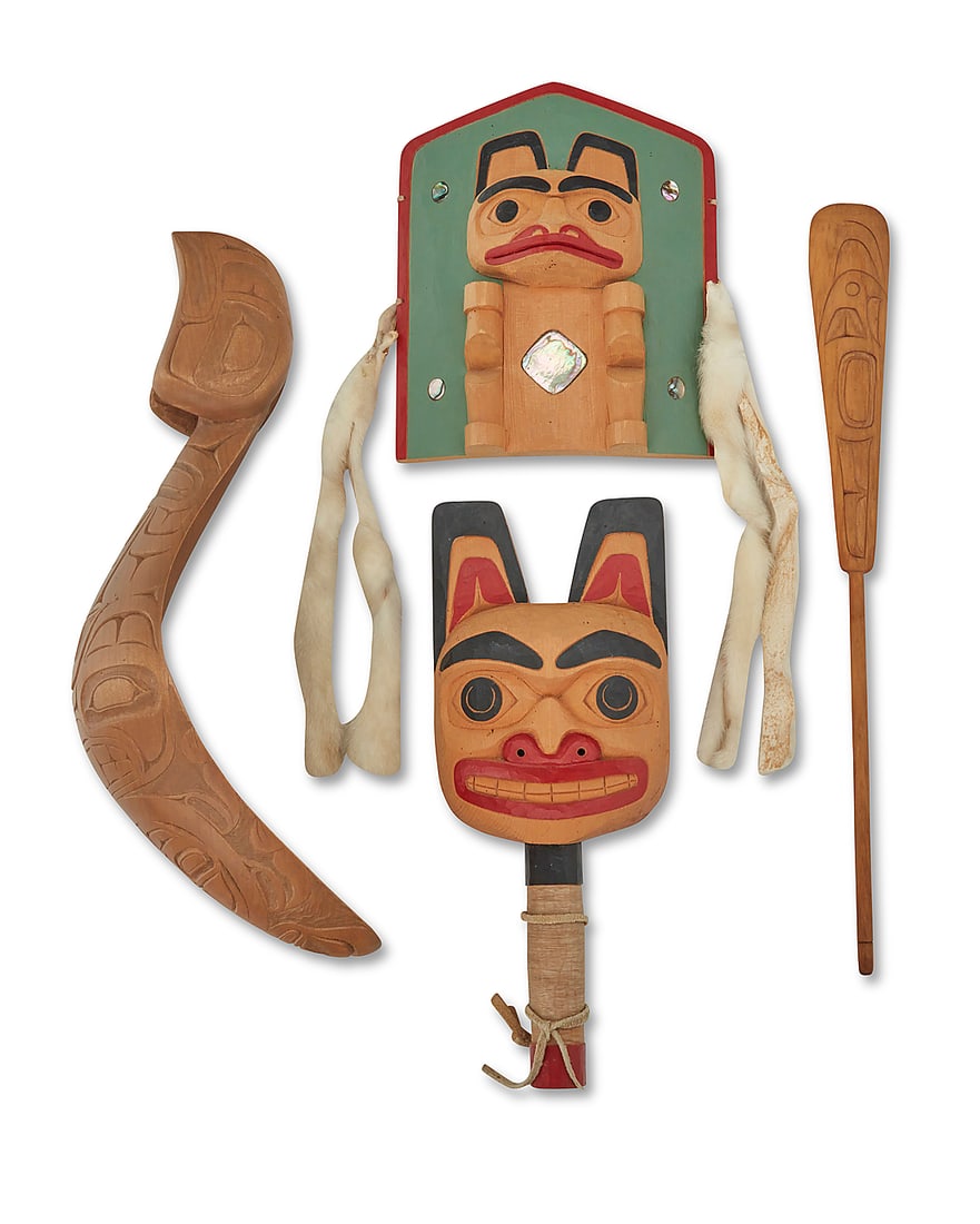 Four Northwest Coast carved wood items: Four Northwest Coast carved wood items Four works: Mike Epp (b. 1962, Gitlaan/Coast Tsimshian) Comprising three carved wood objects including a polychrome bear rattle with sinew-wrapped handle, a