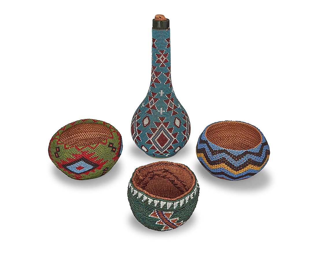 Four Western polychrome beaded basketry items: Four Western polychrome beaded basketry items First half 20th century Comprising two small Paiute coiled beaded baskets, one with repeating zigzag bands, the other with serrated diamond elements, as
