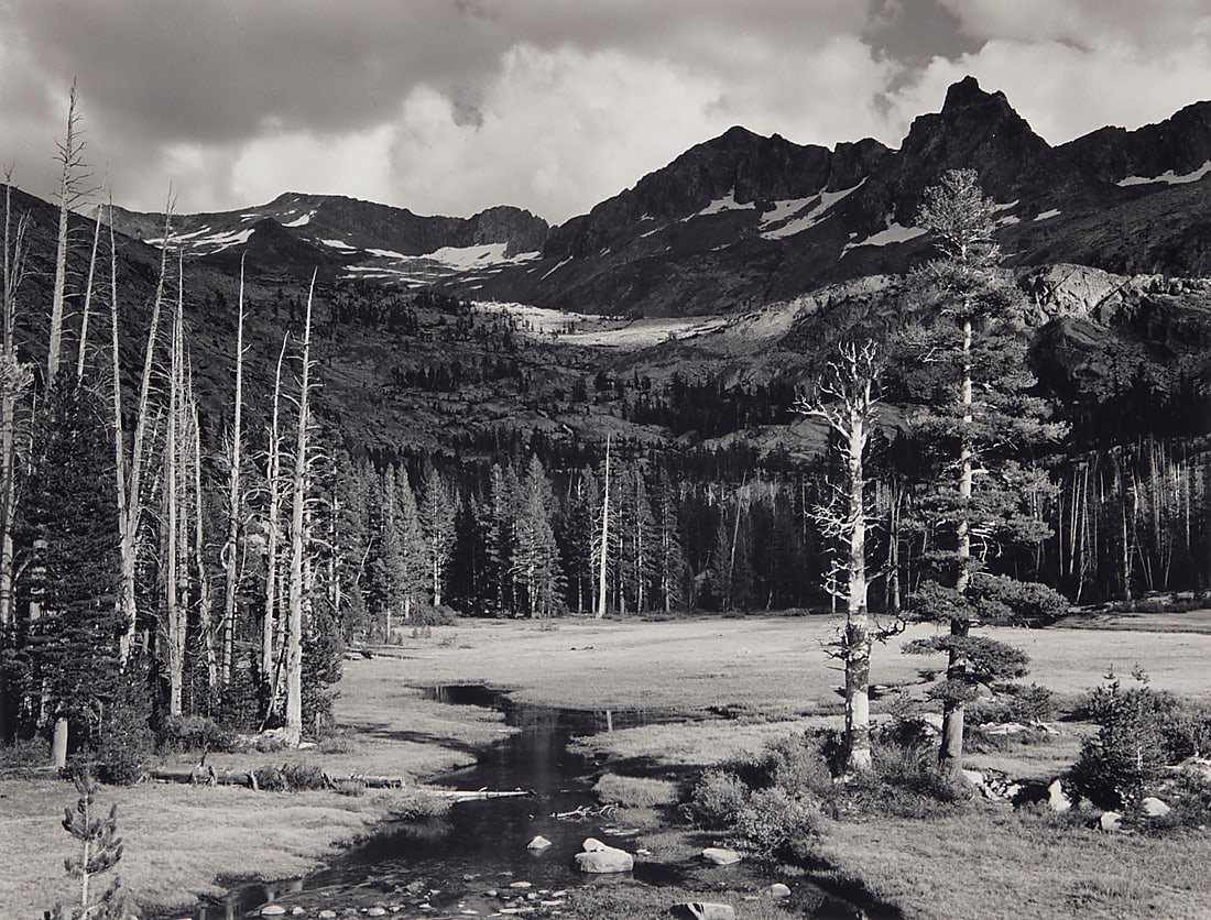 After Ansel Adams (1902-1984), "Peaks and Meadow, Lyell Fork of the Merced River, Yosemite National: After Ansel Adams (1902-1984) "Peaks and Meadow, Lyell Fork of the Merced River, Yosemite National Park," one plate from "Yosemite Special Edition Photographs," 1943 Gelatin silver print on paper