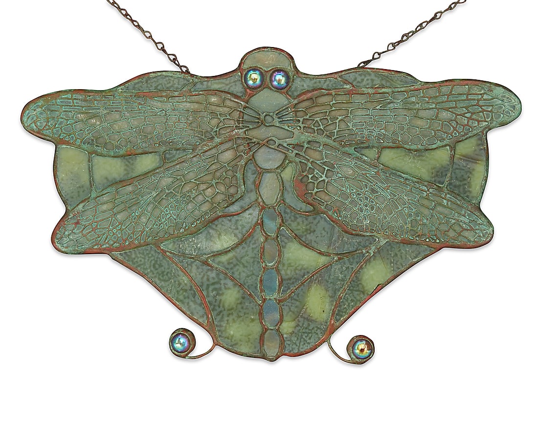 A Tiffany Studios Favrile glass dragonfly lamp screen: A Tiffany Studios Favrile glass dragonfly lamp screen Early 20th century The wings with metal overlay filigree Unmarked Height 6 5/8 in., width 10 1/8 in., depth 1/2 in.