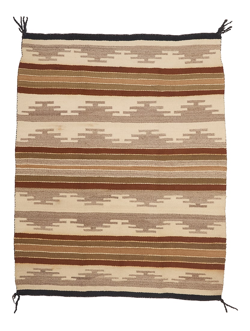 A Dine (Navajo) Chinle/Wide Ruins rug: A Dine (Navajo) Chinle/Wide Ruins rug Second half 20th century Woven in mottled grey, cream, pale brown, and russet wool featuring alternating stepped motif and stripe banding 4 ft. x 3 ft. 2 in. appr