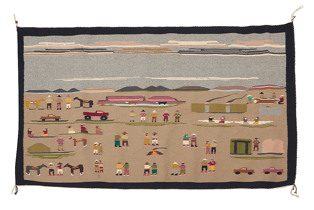 A Dine (Navajo) pictorial rug: A Dine (Navajo) pictorial rug Second half 20th century Woven in black, grey, beige, green, pink and multicolored wool featuring multiple figures, animals, buildings, trucks, within a desert landscape 