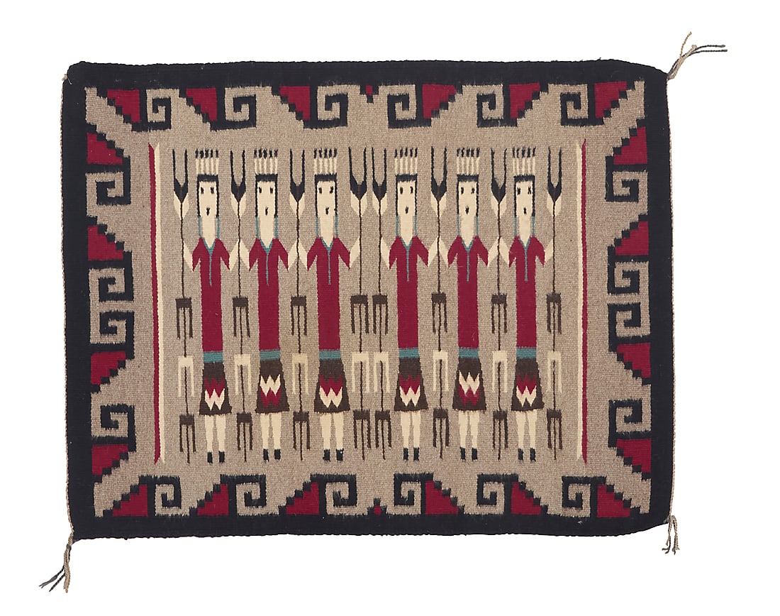 A Dine (Navajo) Yei rug: A Dine (Navajo) Yei rug Second half 20th century, attributed to Eva Jem, Dine Woven in grey, black, dark red, cream, and turquoise blue wool featuring six Yei dancers to the center and with a complex 