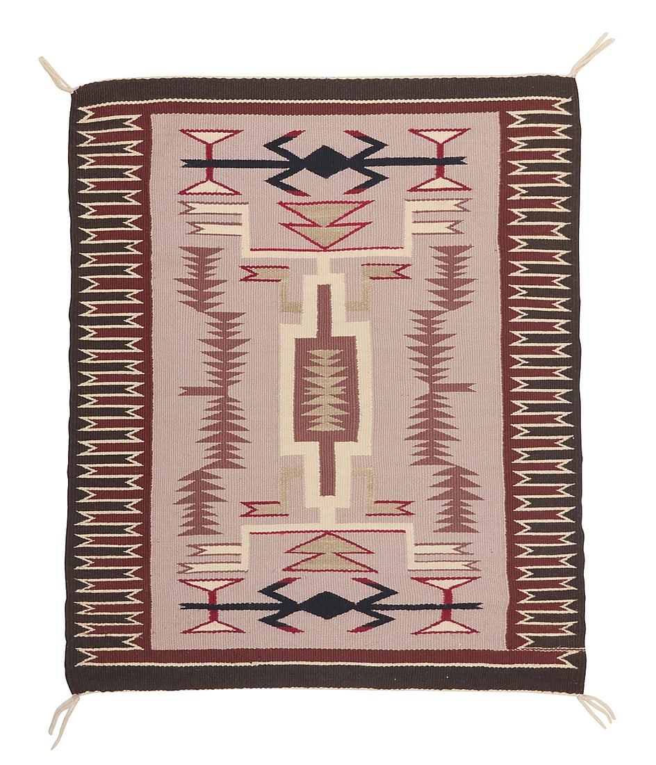 A Dine (Navajo) storm pattern rug: A Dine (Navajo) storm pattern rug Late 20th century With a delicate central storm pattern motif flanked by stacked triangle columns and waterbug motifs, with a complex sawtooth border to two sides, wo