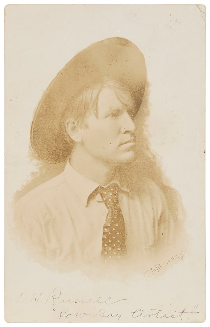 A Charles Marion Russell postcard: A Charles Marion Russell postcard Bears signature and inscribed "Cowboy artist" along the lower edge; With a remarque of a buffalo bearing Charles Marion Russell's initials and bull skull device,