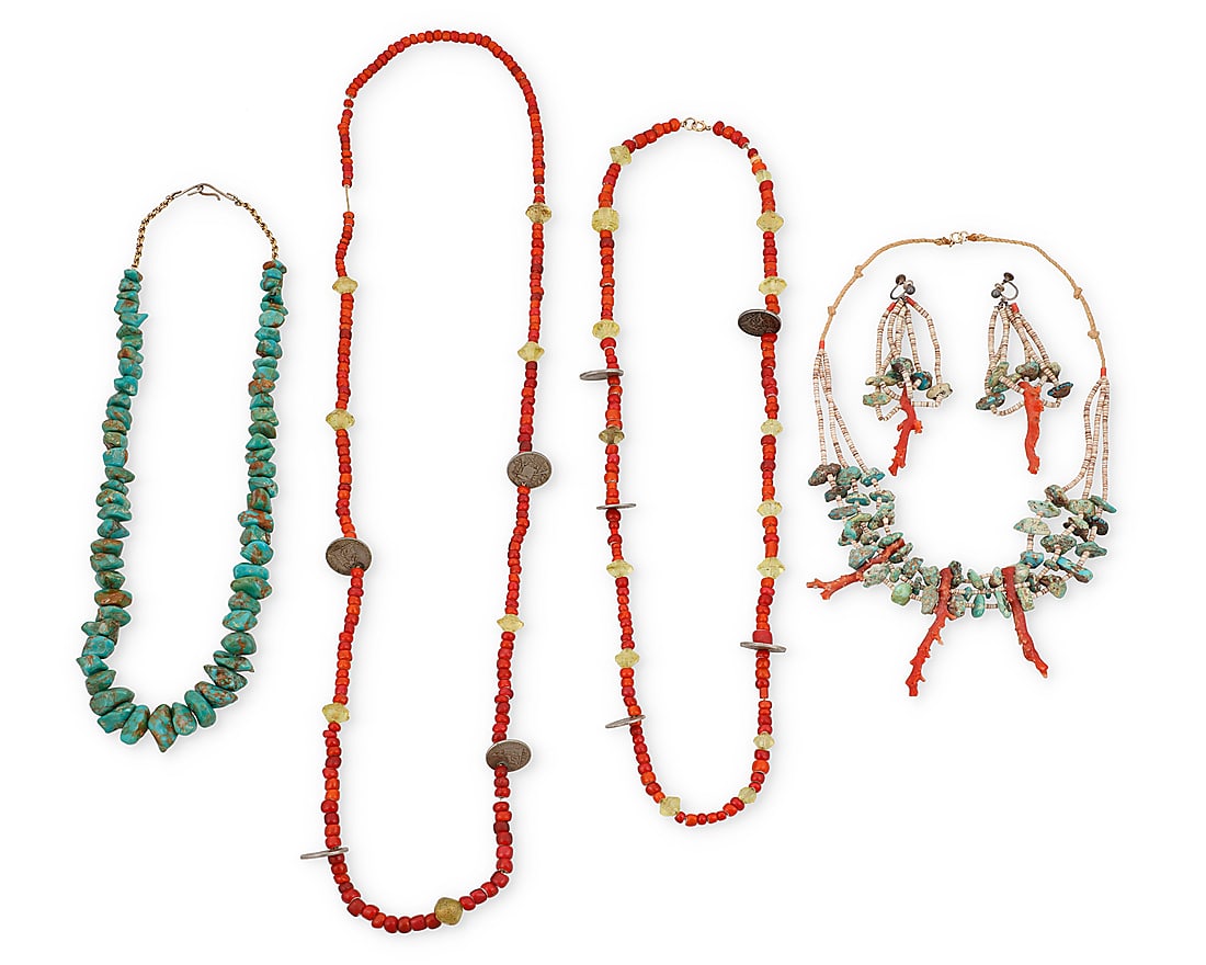A group of Southwest jewelry: A group of Southwest jewelry Early/mid-20th century Comprising two strands of red glass 'white heart' trade beads set with coins and yellow glass spacers, as well as a single strand necklace of