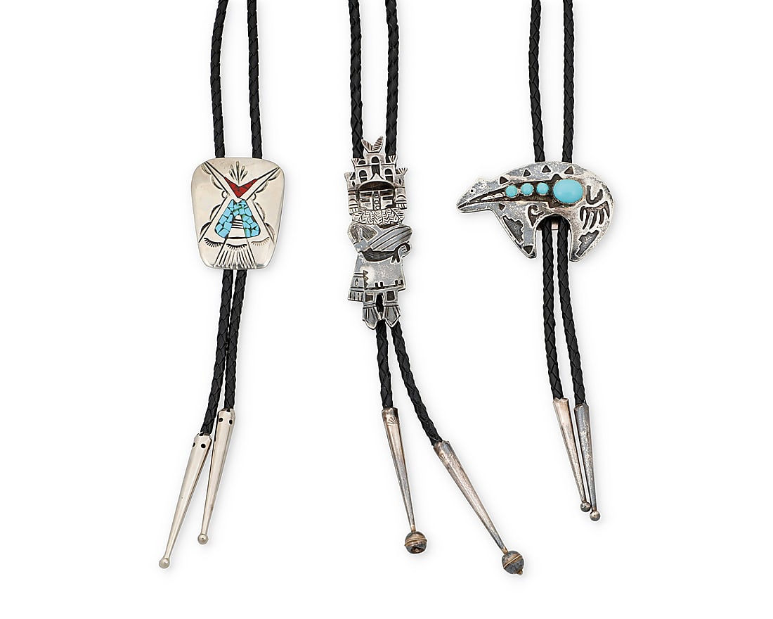 Three Dine (Navajo) or Hopi silver bolo ties: Three Dine (Navajo) or Hopi silver bolo ties Mid/late 20th century Featuring a trio of figural bolos in silver including a sculptural sterling silver overlay katsina motif bolo, a Mabel Kee Dine sterl