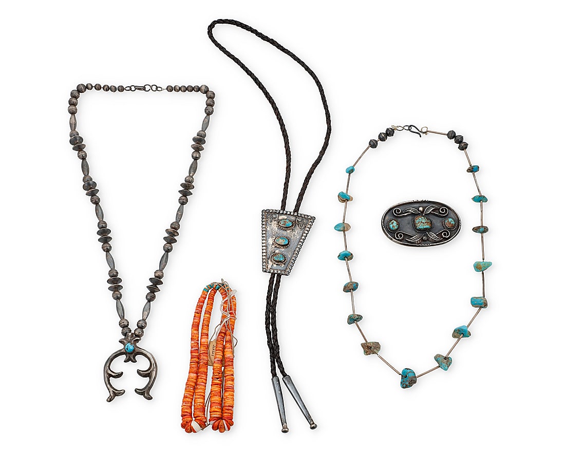 Five Southwest jewelry items: Five Southwest jewelry items Mid-20th century Comprising a sterling silver necklace with a set turquoise and cast silver naja and a sterling silver and set turquoise bolo tie, as well as a Pueblo-styl