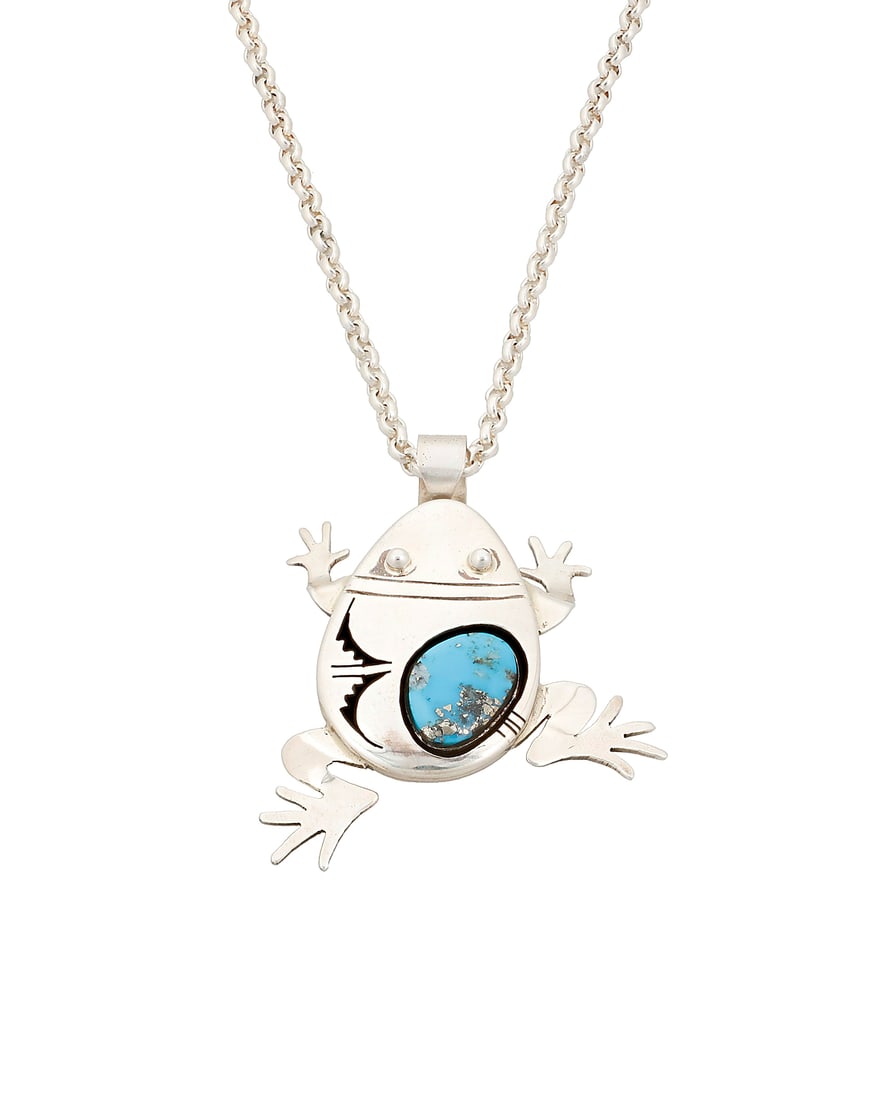 Bennie Ration (b. 1955, Dine [Navajo]), A silver and turquoise necklace: Bennie Ration (b. 1955, Dine [Navajo]) A sterling silver climbing frog figural pendant/brooch with set oblong turquoise stone and incised silver geometric accents, suspended from a silver chain Stampe