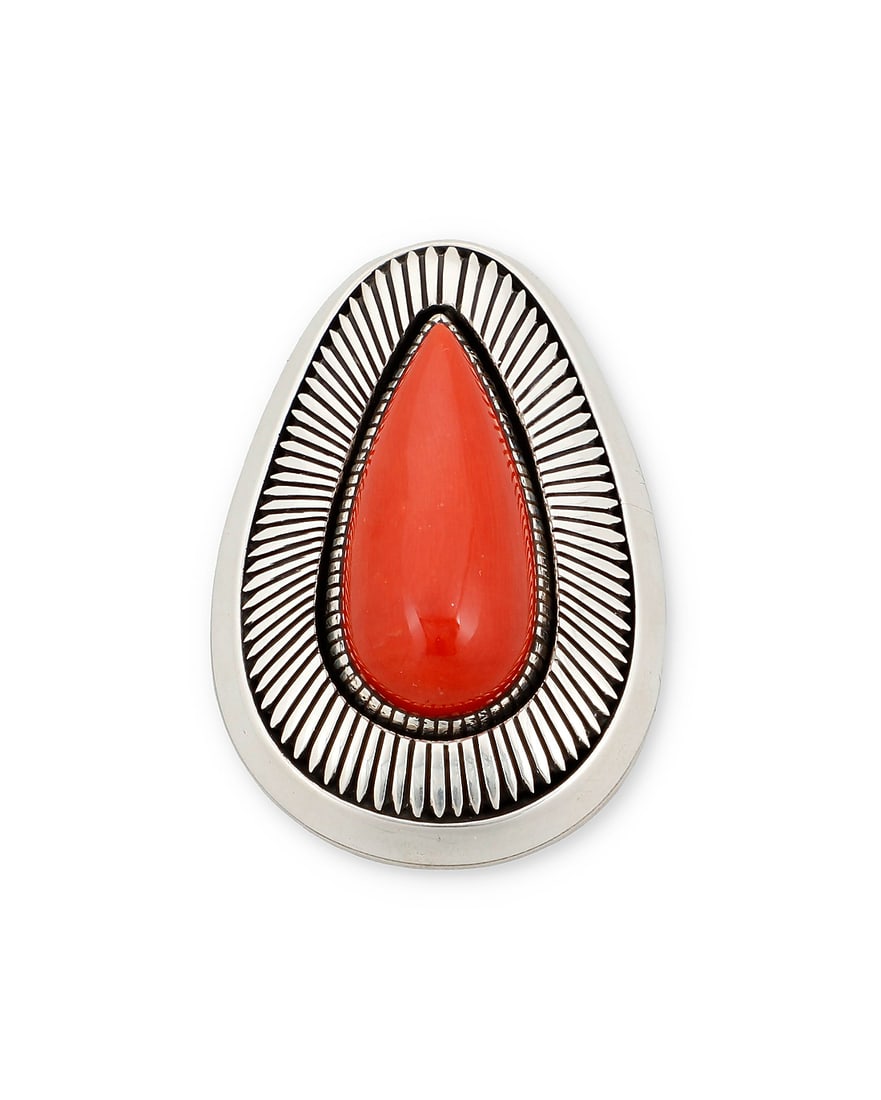 Herman Vandever (b. 1964, Dine [Navajo]), A silver and coral pendant: Herman Vandever (b. 1964, Dine [Navajo]) A sterling silver and set coral teardrop pendant with fine line sunburst stampwork Etched signature verso 2 3/8 x 1 1/2 in. 61.7 grams gross Provenance: