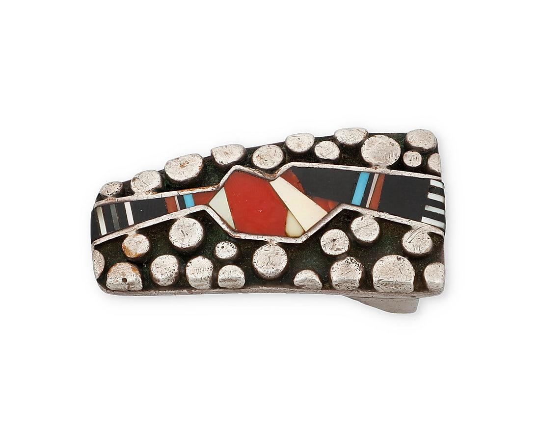 Danny Romero (1954-2018, Yaqui/Spanish), A silver and multi-stone belt buckle: Danny Romero (1954-2018, Yaqui/Spanish) A tapered sterling silver belt buckle with scattered raised silver dots mosaic stone inlay including turquoise, coral, and mother of pearl Stamped: D R.MER. /