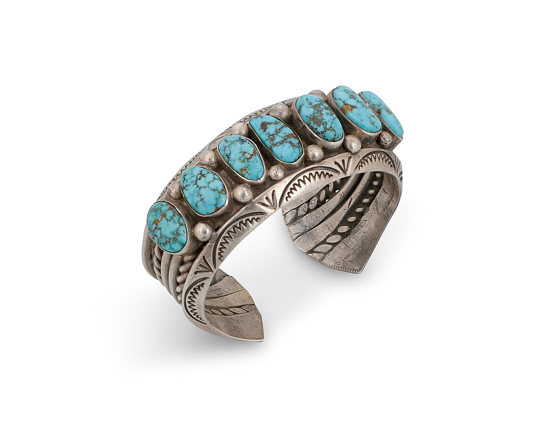 A Dine (Navajo) sterling silver and turquoise cuff bracelet (1 of 2)