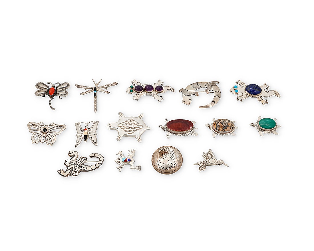 A large group of Southwest-style figural sterling silver and set stone brooches (1 of 2)