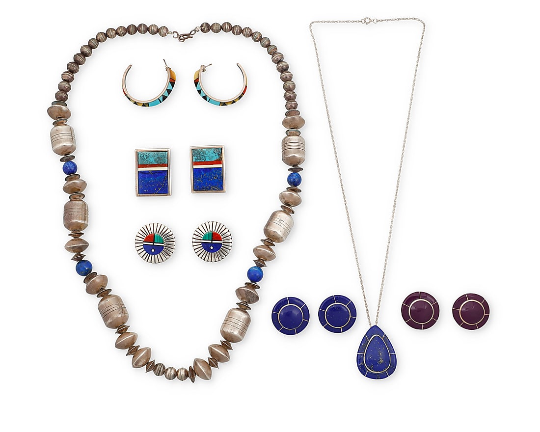 Seven Southwest silver jewelry items: Seven Southwest silver jewelry items Late 20th/21st century Comprising a chunky silver necklace featuring blue lapis lazuli beads and large sterling silver barrel beads, and a lapis lazuli inlay teard