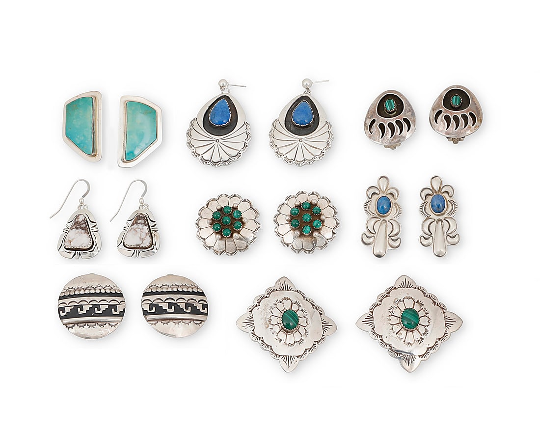 Eight pairs of Southwest silver and set stone earrings: Eight pairs of Southwest silver and set stone earrings Late 20th century Comprising eight pairs of earrings in various styles including concho stampwork and repousse designs, shadowbox, and silver ove