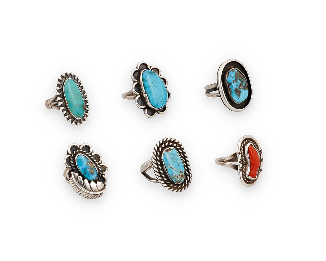 Six Southwest silver and turquoise rings: Six Southwest silver and turquoise rings Mid/late 20th century A group of sterling silver and set turquoise or coral rings in various styles and shapes including one shadowbox set, and one with applie