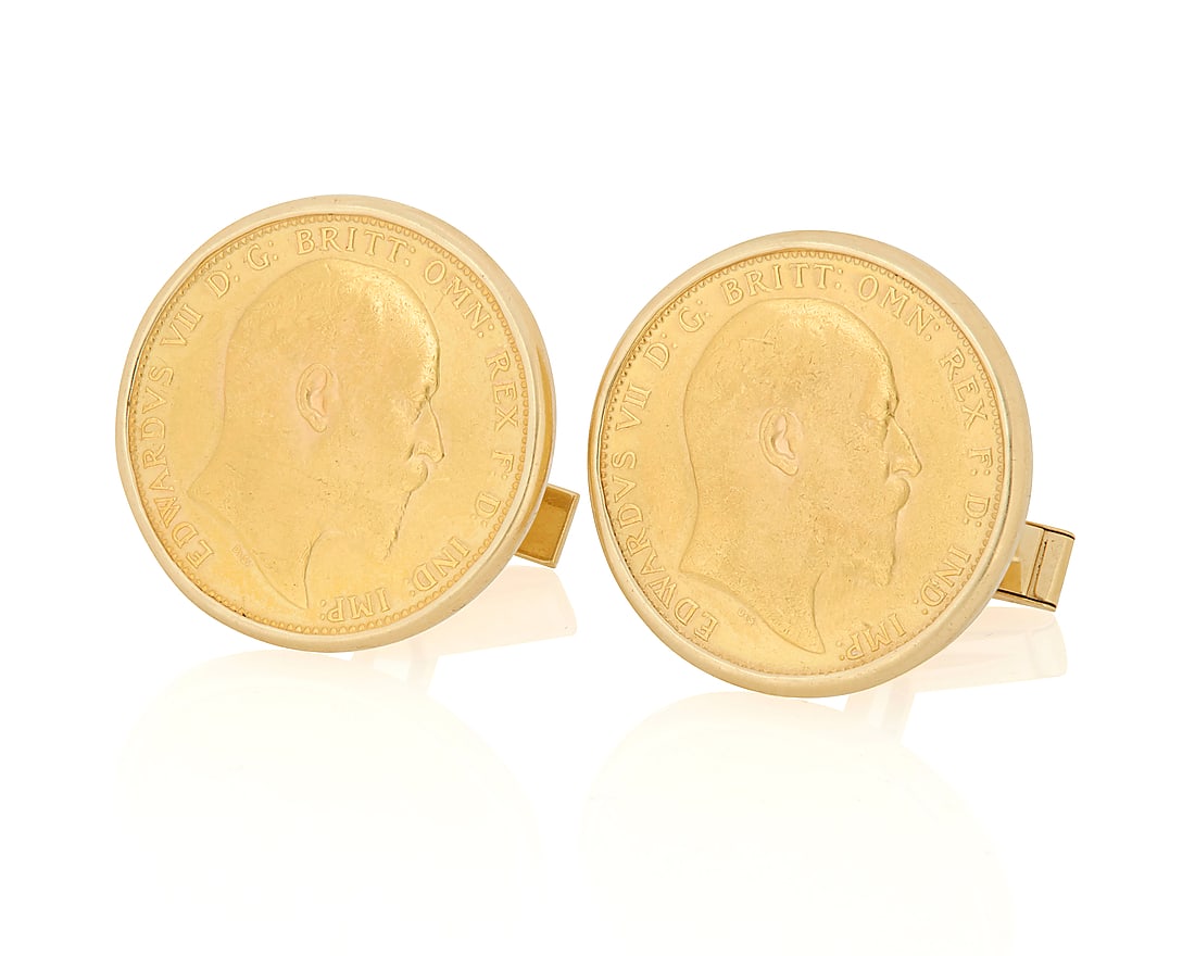 A Pair of Gold Coin Cufflinks Featuring two 22k gold British Sovereign coins, set in 14k gold: A Pair of Gold Coin Cufflinks Featuring two 22k gold British Sovereign coins, set in 14k gold frames 2 pieces Measures: 7/8 x 7/8 in. 23.7 grams gross