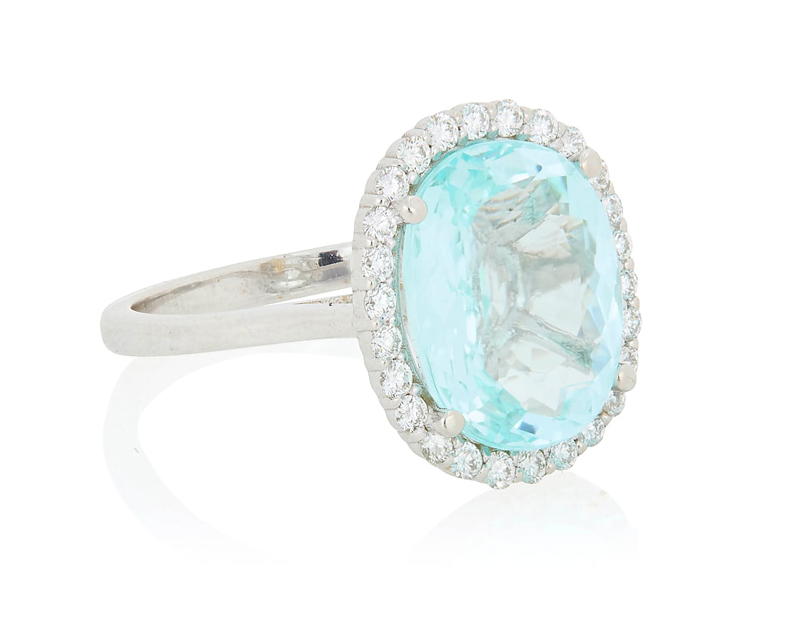 An 18K White Gold, Paraiba Type Tourmaline and Diamond Ring Centering an oval Paraiba type (1 of 6)