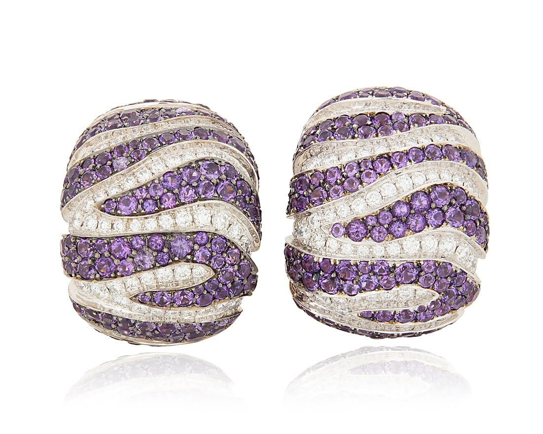 De Grisogono: A Pair of 18K Bi-Color Gold, Amethyst and Diamond Earrings Featuring alternating: De Grisogono: A Pair of 18K Bi-Color Gold, Amethyst and Diamond Earrings Featuring alternating stripes of round amethyst accented by round diamonds weighing approximately 2.30 carats, signed de Grisog