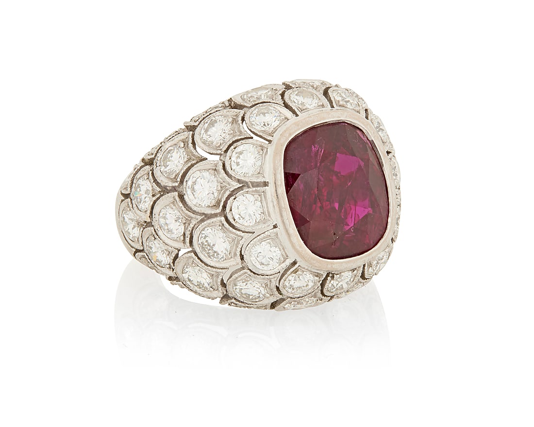 A 18K White Gold, Ruby and Diamond Ring Featuring a cushion-cut ruby weighing approximately 5.60 (1 of 4)