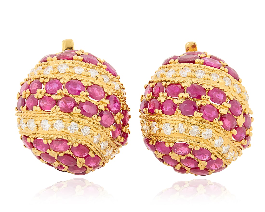 A Pair of 14K Gold, Ruby and Diamond Earrings Of a domed design featuring alternating bands of (1 of 3)