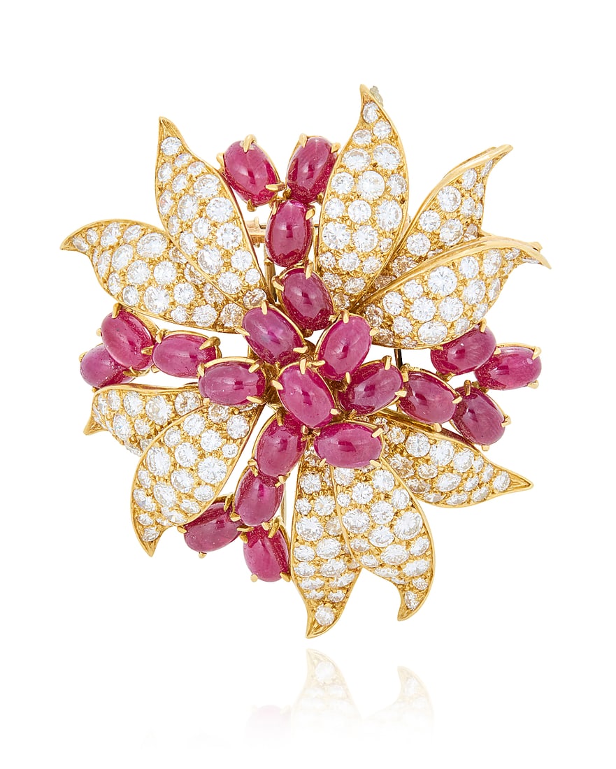 An 18K Gold, Ruby and Diamond Pin Of a foliate design featuring leaves set with round diamonds (1 of 3)