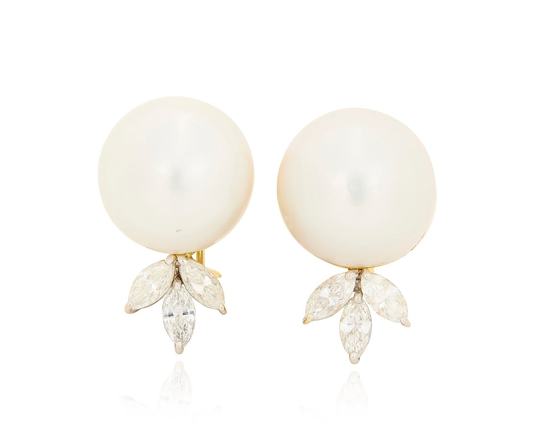 A Pair of 18K Bi-Color Gold, Cultured Pearl and Diamond Earrings Featuring two button pearls: A Pair of 18K Bi-Color Gold, Cultured Pearl and Diamond Earrings Featuring two button pearls measuring approximately 14.35 and 14.60 mm, accented by six marquise-shaped diamonds weighing approximately