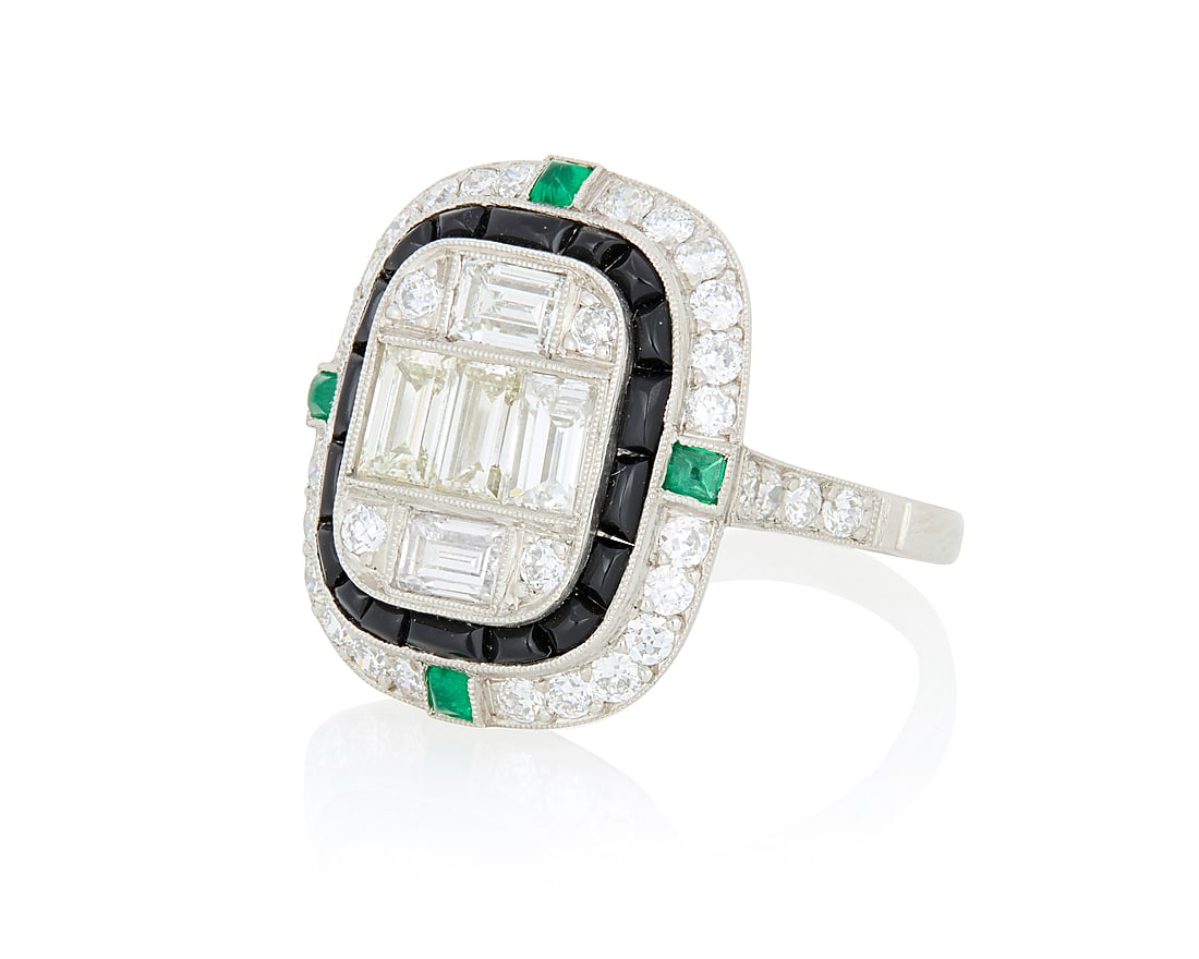 A Platinum, Emerald, Onyx and Diamond Ring Featuring a geometric design, centering four baguette (1 of 3)