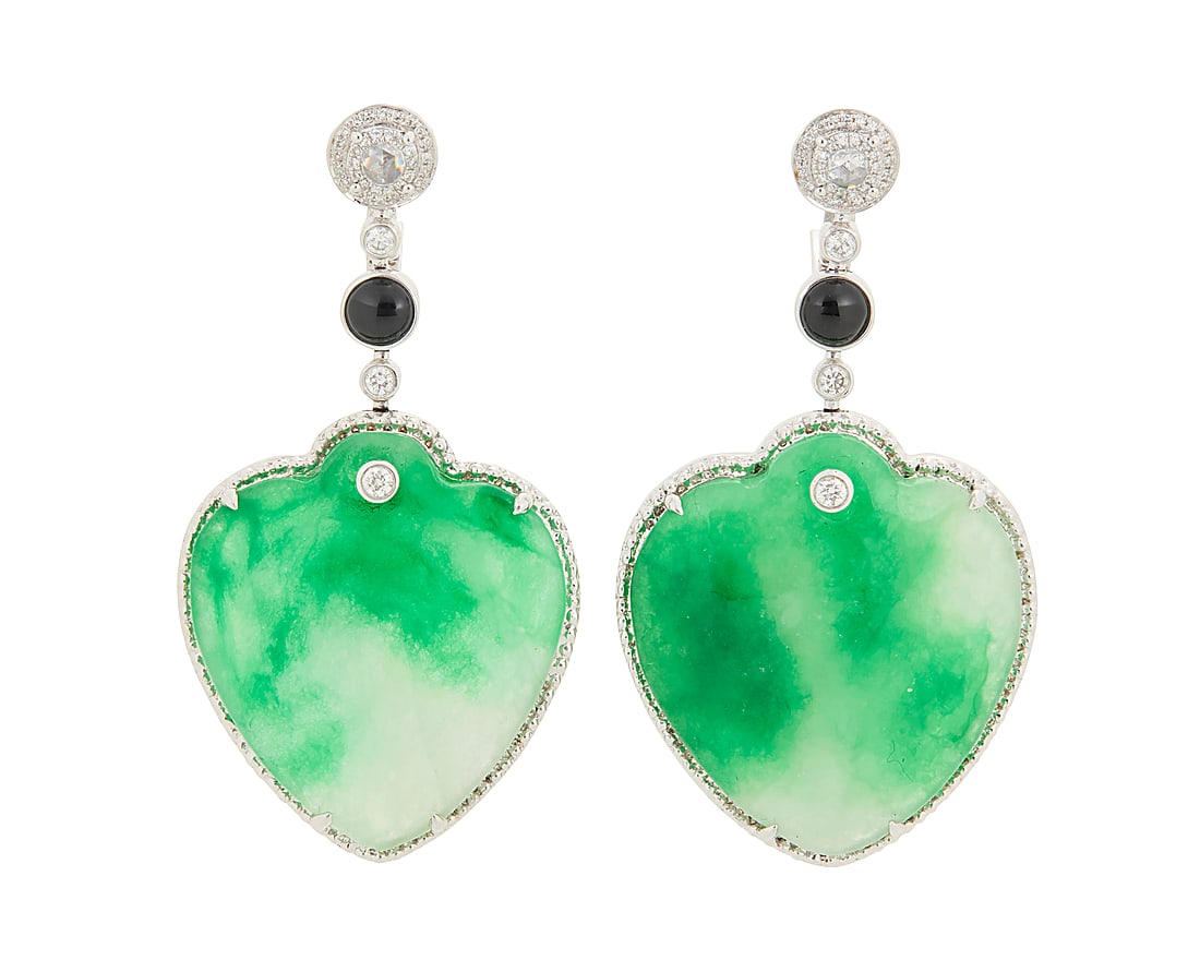 A Pair of 18K White Gold, Jade, Onyx and Diamond Earrings Suspending two heart-shaped jade: A Pair of 18K White Gold, Jade, Onyx and Diamond Earrings Suspending two heart-shaped jade cabochons measuring approximately 32.00 x 26.00 x 3.66 mm, accented by two onyx cabochons and finished with r