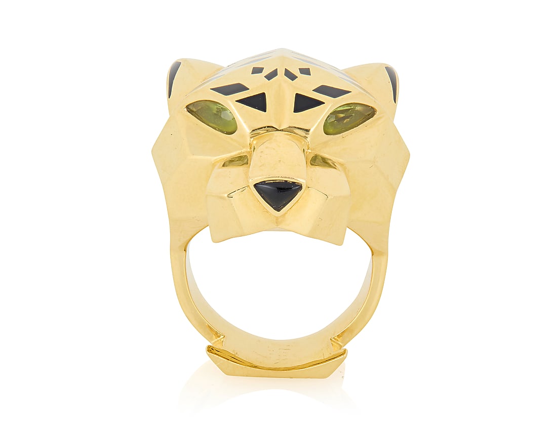 Cartier: An 18K Gold and Lacquer 'Panthere de Cartier' Ring Of a high polish angular design,: Cartier: An 18K Gold and Lacquer 'Panthere de Cartier' Ring Of a high polish angular design, featuring two pear-shaped peridot, an onyx cabochon and finished with black lacquer spots, signed Cartier, 