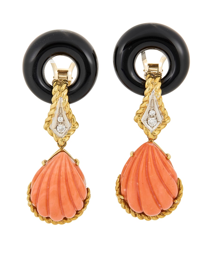A Pair of 18K Bi-Color Gold, Coral and Onyx Earrings Featuring two carved onyx discs, suspending: A Pair of 18K Bi-Color Gold, Coral and Onyx Earrings Featuring two carved onyx discs, suspending two carved coral pieces, accented by four round diamonds, signed Italy 2 pieces Measures: 2 1/2 x 7/8 i