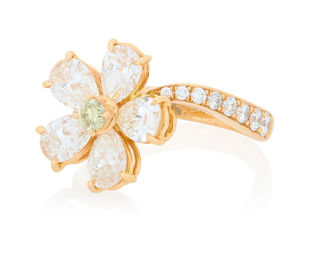 An 18K Rose Gold and Diamond Flower Ring Featuring a floral design set with pear-shaped diamond (1 of 4)