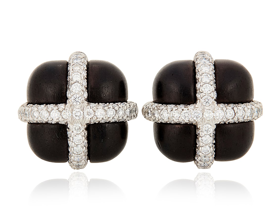 Seaman Schepps: A Pair of 18K White Gold, Diamond, and Ebony Wood Earrings Of a cross over design (1 of 3)