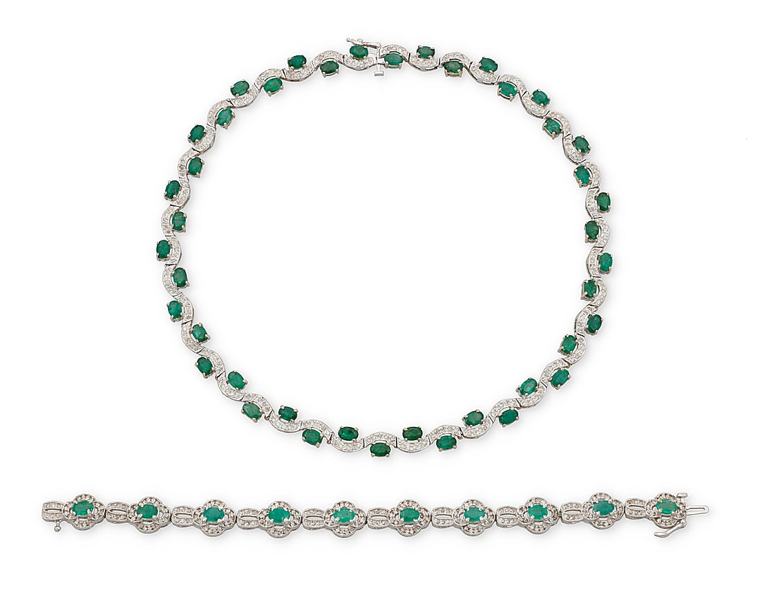 A 14K White Gold, Emerald and Diamond Necklace and Bracelet Set Of a wave design featuring: A 14K White Gold, Emerald and Diamond Necklace and Bracelet Set Of a wave design featuring alternating emeralds and round diamonds, estimated total emerald weight 16.50 carats and diamond weight 3.50 