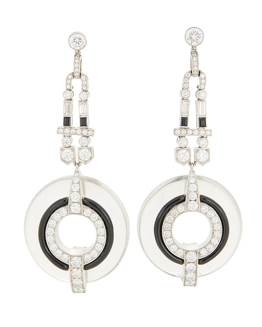 A Pair of Platinum, Rock Crystal Quartz and Onyx Earrings Of a drop design suspending carved rock (1 of 4)