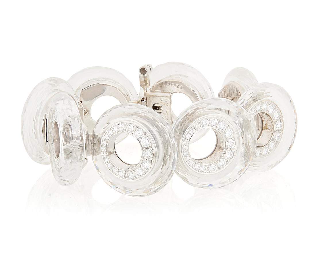 Aletto Bros: An 18K White Gold, Rock Crystal and Diamond Bracelet Featuring eight faceted rock: Aletto Bros: An 18K White Gold, Rock Crystal and Diamond Bracelet Featuring eight faceted rock crystal quartz discs, lined by graduated round diamonds weighing approximately 7.90 carats, signed Aletto