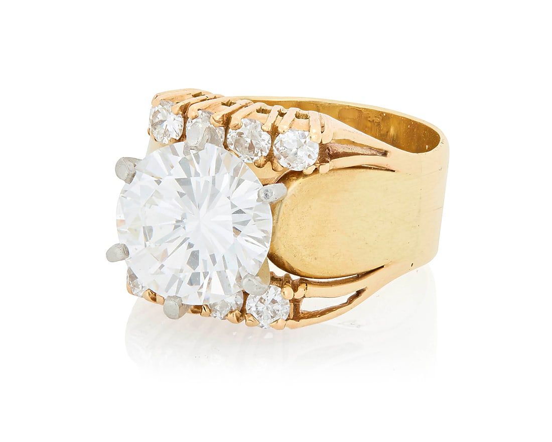 A 14K Gold and Diamond Ring Centering a round brilliant-cut diamond weighing approximately 3.34 (1 of 4)
