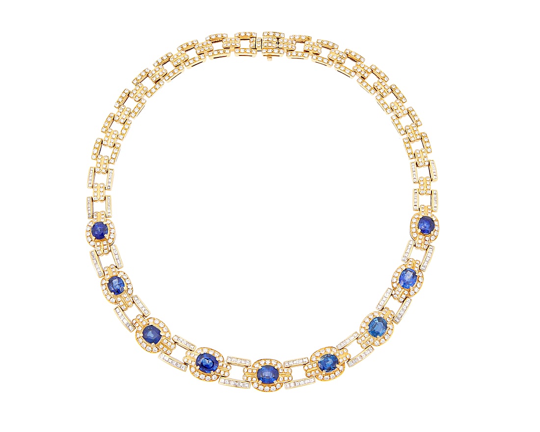 An 18K Gold, Sapphire, and Diamond Necklace Centering nine oval sapphires weighing approximately (1 of 3)