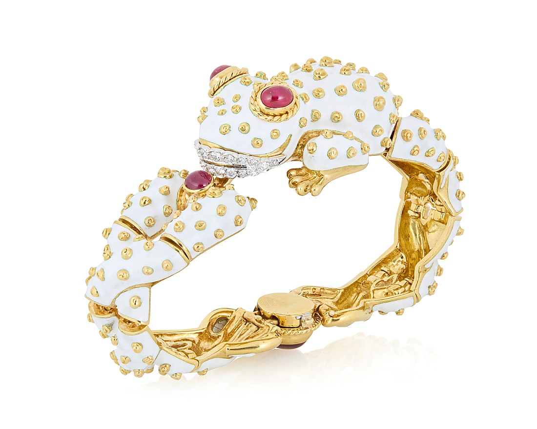 David Webb: An 18K Gold, Platinum, Enamel and Ruby Frog Bracelet Of a Frog design accented by: David Webb: An 18K Gold, Platinum, Enamel and Ruby Frog Bracelet Of a Frog design accented by spiraling gold granulation and round diamonds finished with three oval cabochon rubies, signed Webb Inner 