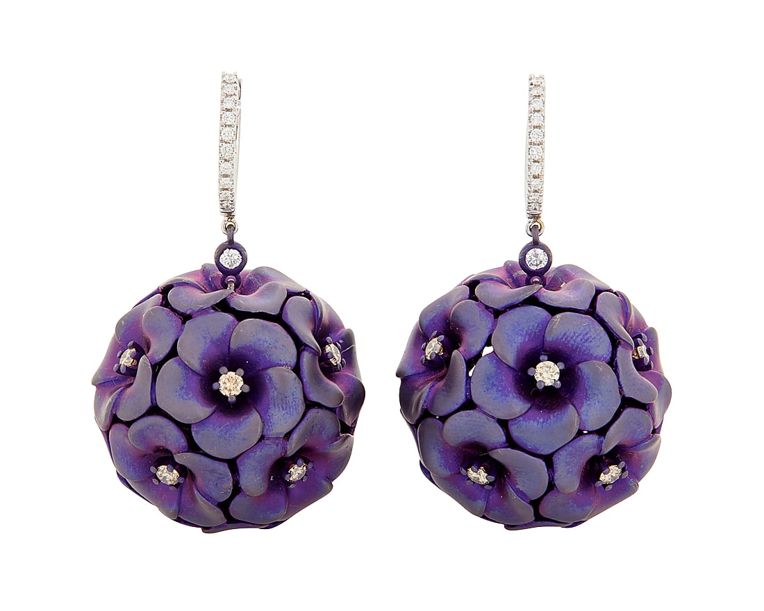 Alexis NY: A Pair of 18K White Gold, Titanium and Diamond Earrings Of a spherical design: Alexis NY: A Pair of 18K White Gold, Titanium and Diamond Earrings Of a spherical design featuring blossoming flower motifs centering round brown diamonds weighing approximately 0.95 carats, signed Al