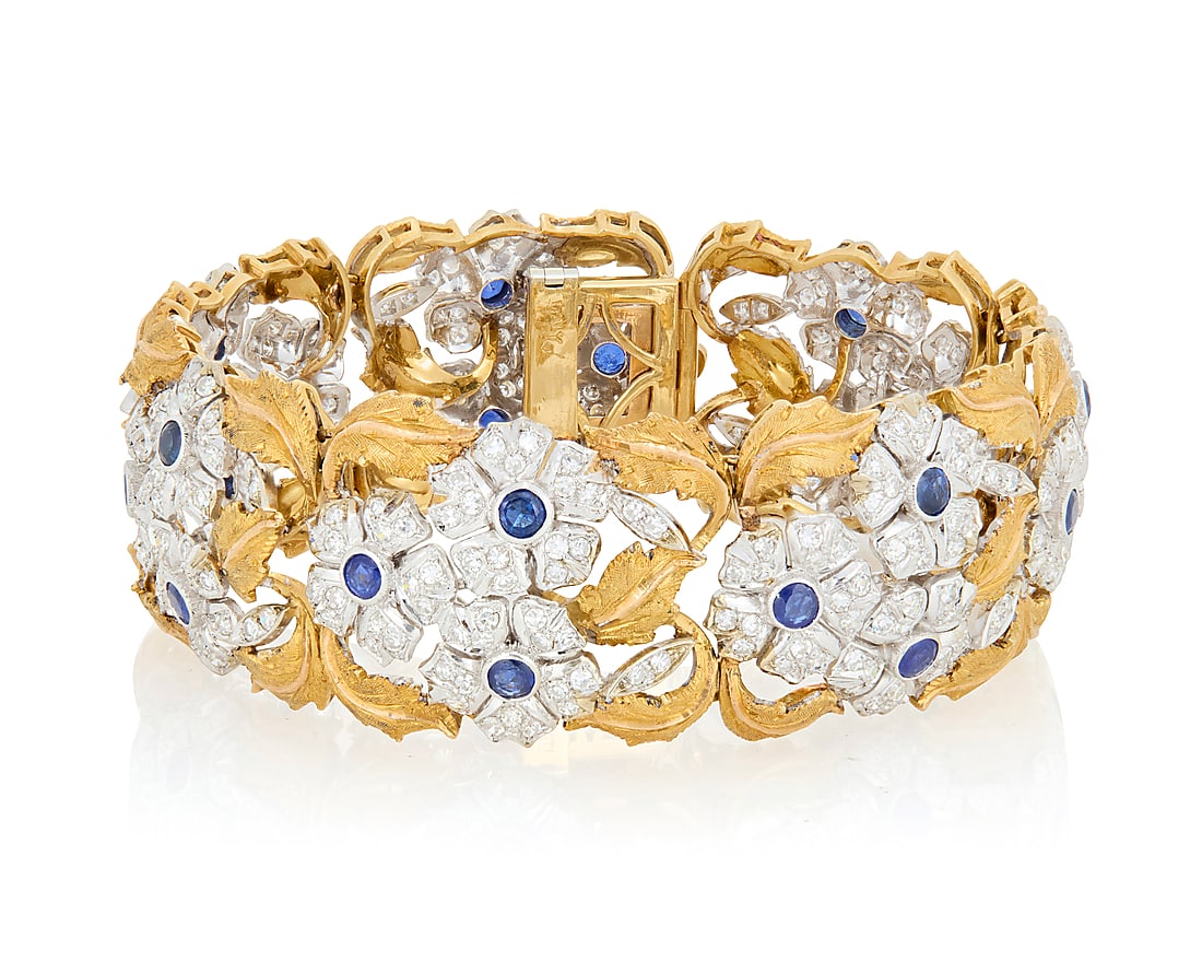 An 18K Bi-Color Gold, Sapphire and Diamond Bracelet Featuring floral motif links, accented by (1 of 3)