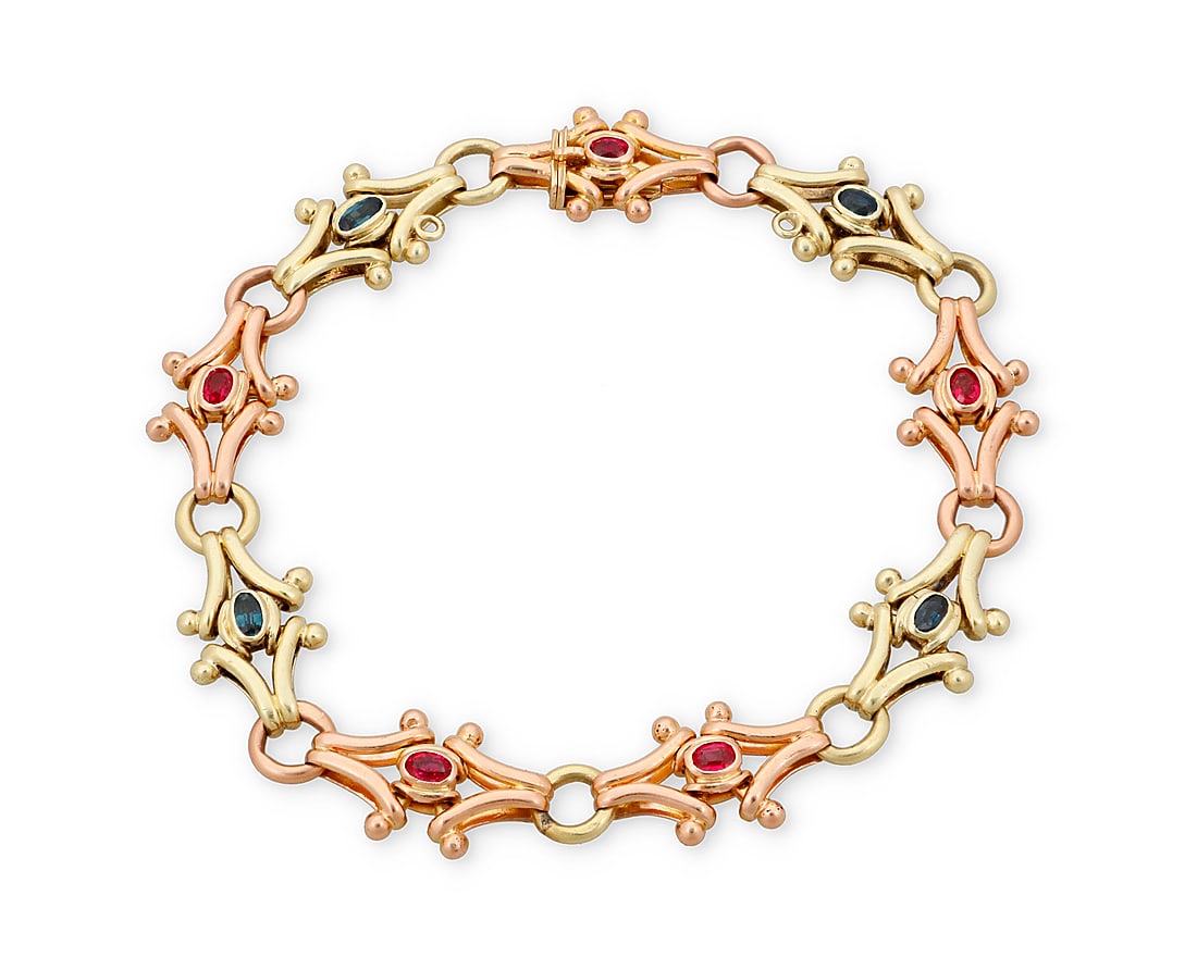 A 14K Bi-Color Gold and Gem-Set Bracelet Featuring fancy alternating links of rose and yellow (1 of 4)