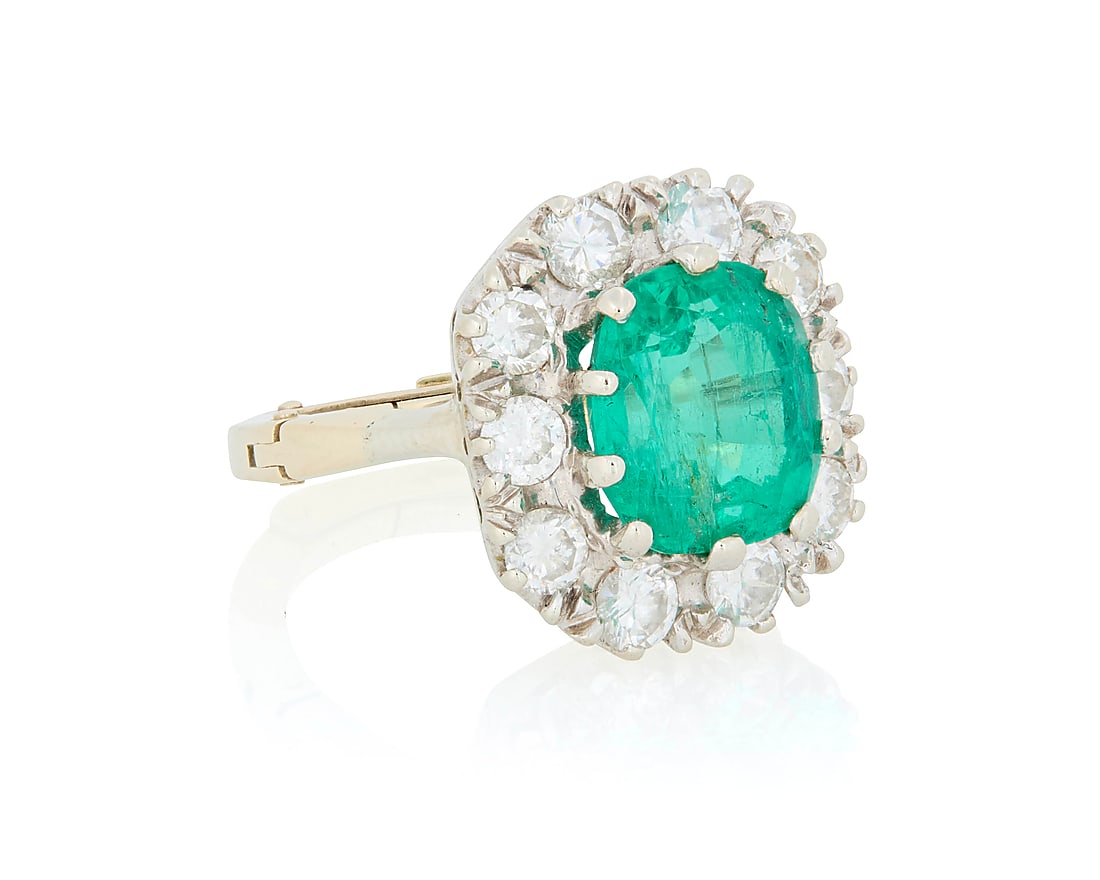 A 14K White Gold, Emerald and Diamond Ring Centering an octangular-cut emerald weighing (1 of 3)