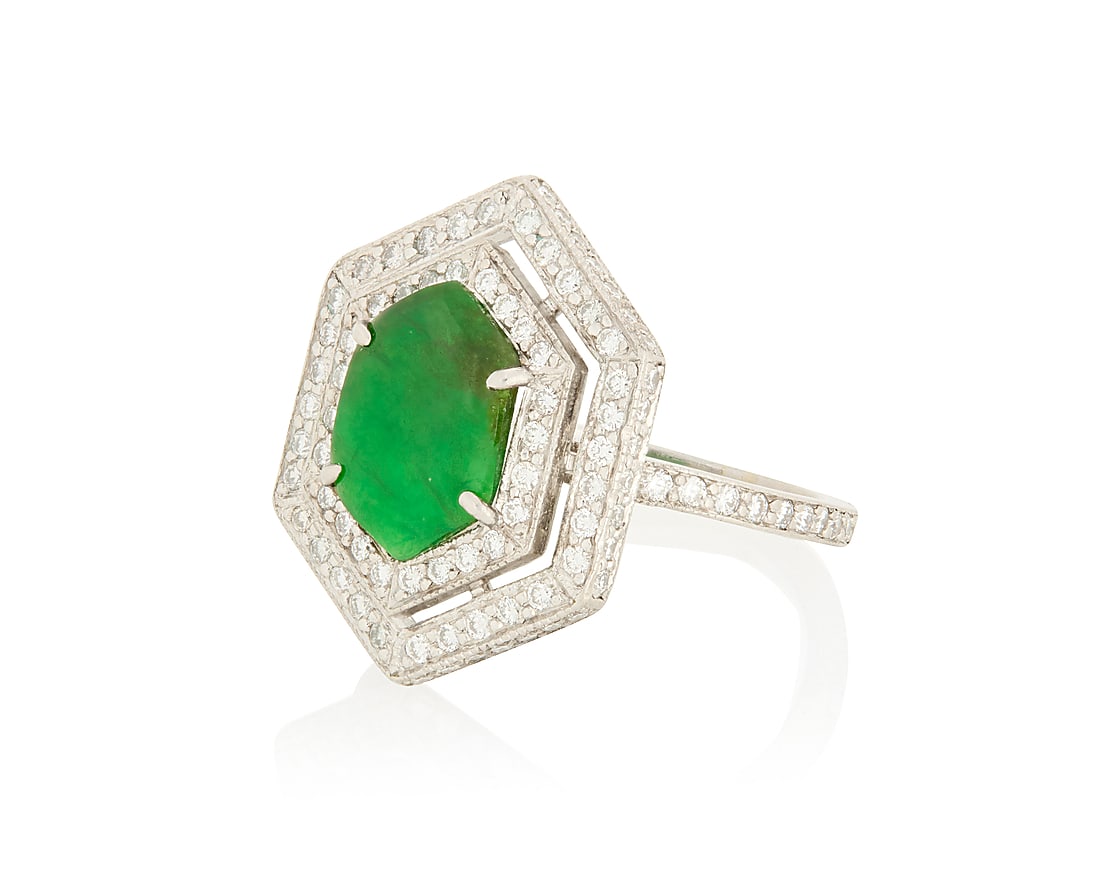 Fred Leighton: A Platinum, Jade and Diamond Ring Featuring a lozenge jade tablet, encircled by two: Fred Leighton: A Platinum, Jade and Diamond Ring Featuring a lozenge jade tablet, encircled by two rows of round diamonds weighing approximately 0.85 carats, signed Fred Leighton Size: 6 7.0 grams gro